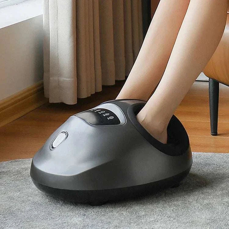 Shiatsu foot massager machine with air compression and deep kneading features in use.