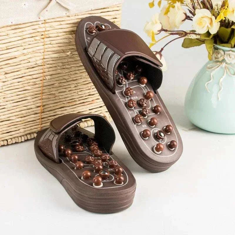 Foot Massager Acupuncture Slippers with acupressure nodes for reflexology and ergonomic design.